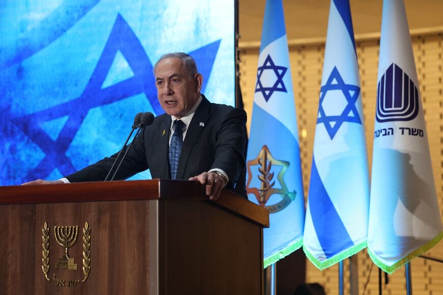Israeli Prime Minister Benjamin Netanyahu speaks during a commemoration ceremony for soldiers killed during the 2014 Gaza war at the Memorial Hall on Mount Herzl in Jerusalem on July 16, 2024 Israeli Prime Minister Benjamin Netanyahu speaks during a commemoration ceremony for soldiers killed during the 2014 Gaza war at the Memorial Hall on Mount Herzl in Jerusalem on July 16, 2024