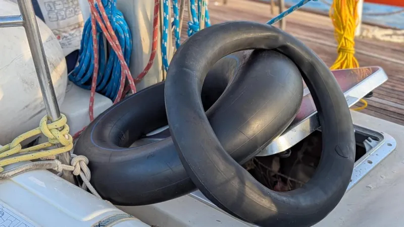 The young migrant had a simple life jacket and two inner tubes around her waist